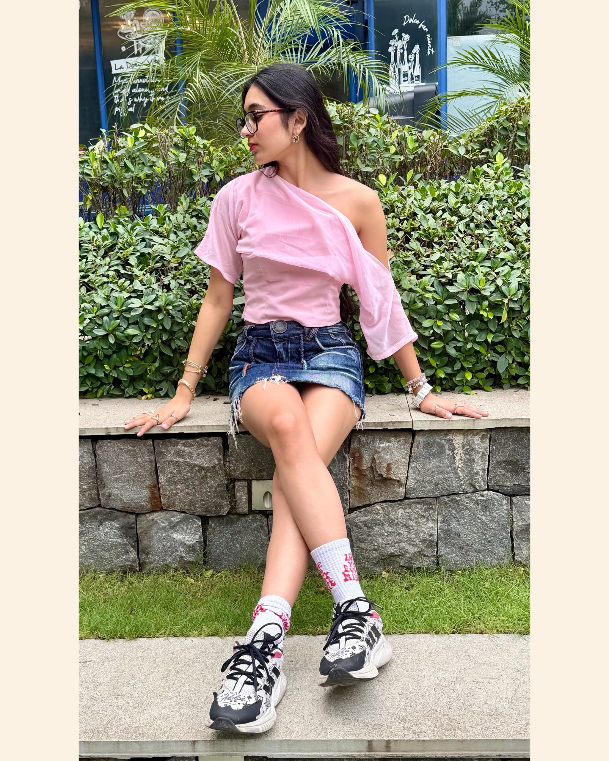The Bubble Pink Top, worn outdoors in natural light